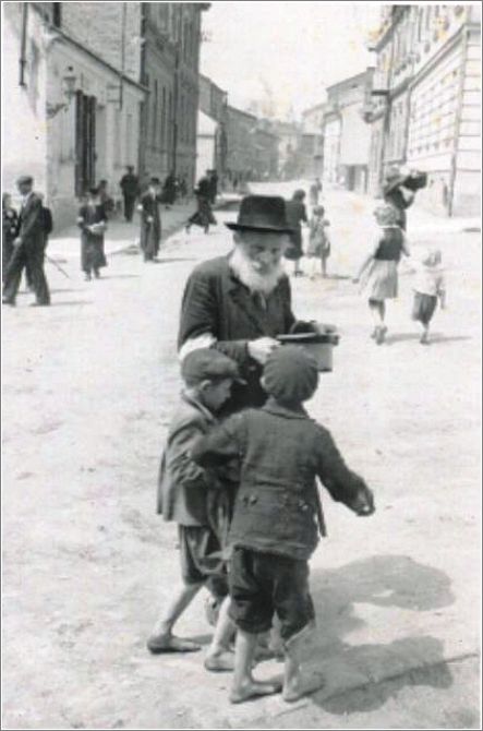 Jewish man and children in the Przemysl ghetto